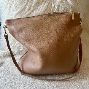 Tan hobo bag by Primecut. Barely used and in excellent condition!